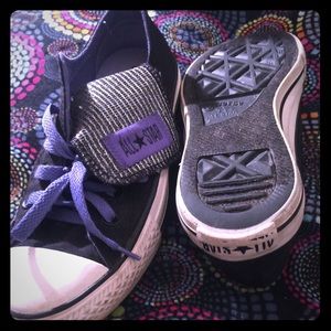 Purple and black converses